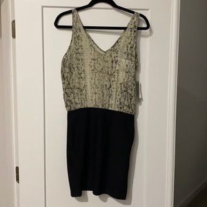 Snakeskin and black block mini dress